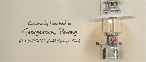 Lantern-lit Georgetown street at night near Red Inn Court