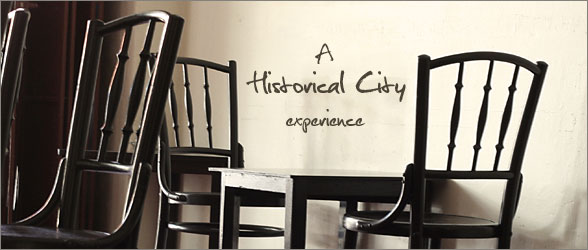 Heritage chairs and tables inside Red Inn Court